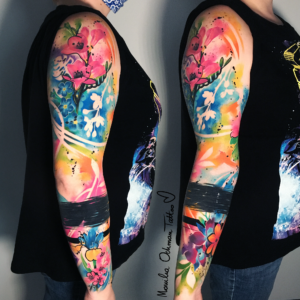 Tatuaż kwiatowy tzw. rękaw autorstwa Moniki Ochman Tattoo